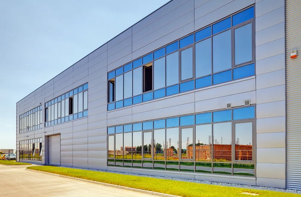 High modern commercial building with reflective window film installed by Amertint in Dallas Fort Worth TX